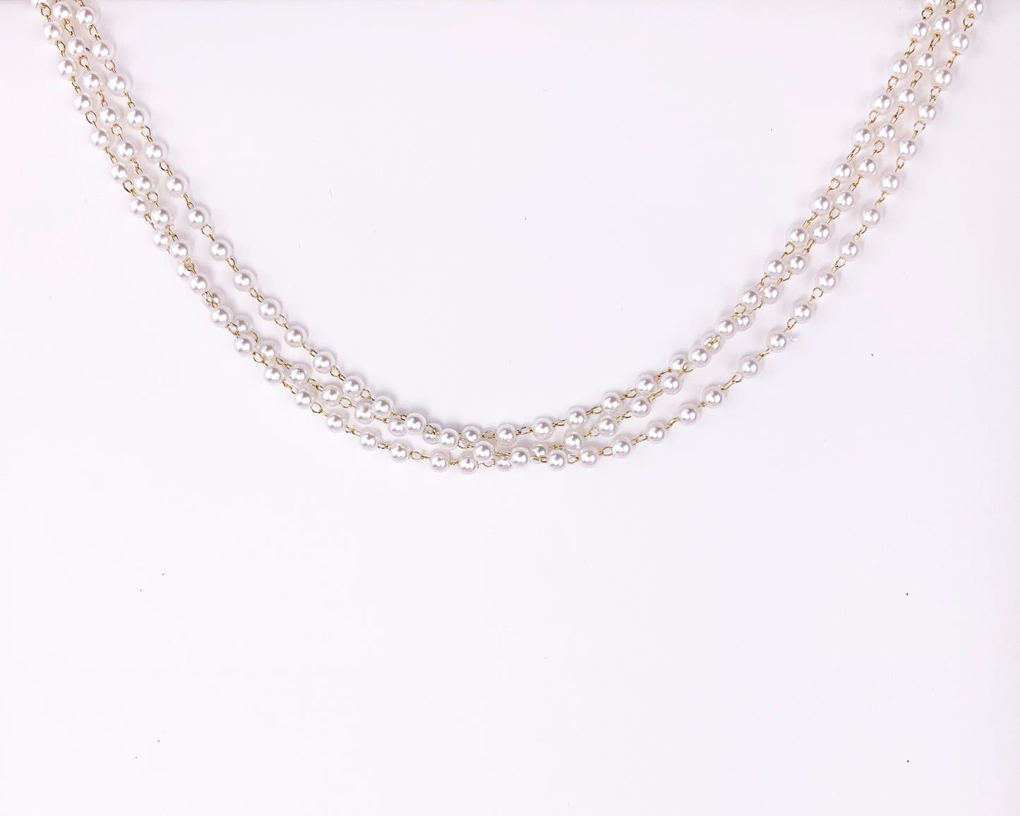 Collar triple cadena de perlas